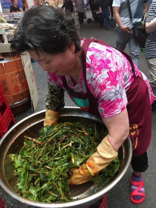 Kimchi in the making! I learned to respect the variations of this potent ingredient as ate our way through the city.