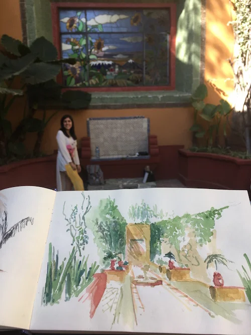 I am holding one of Pau’s sketches she dashed off in the botanical gardens with her in the background. My work was getting closer to this level of spontaneous beauty - but I’ll need a bit more practice before I post my efforts.