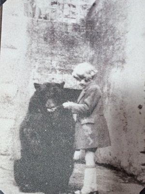 Winnie with Christopher Robin at the London Zoo from the album pages in Finding Winnie