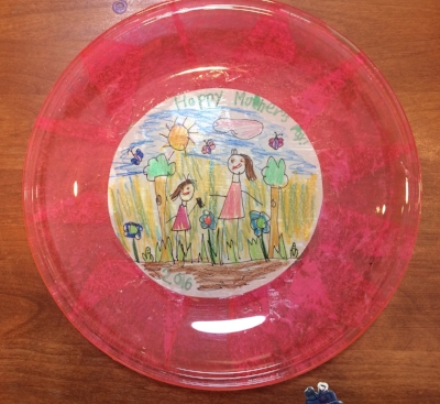 Little Lion made me this plate above for Mother's Day. Do you know I missed the Mother's Day celebration at school with Mini Me this year? I had the flu, even though I got my flu shot. And, yes, I still have guilt over it even though I sent my twin in my place. (I have an actual twin, not a clone.) The thumbnail pic above is LL and me walking in Laguna last week--she's wearing her new Naida cloak that I finished just in time for Halloween. This picture was taken right before she had a meltdown in one of the boutiques because I wouldn't buy her the $74 boots that I knew she wouldn't wear. Thank you to the shop person for being understanding. Posted with Permission