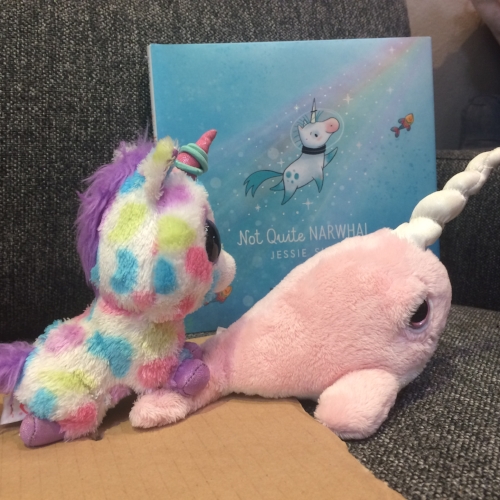 Little Lion set up this shot of Kelp swimming with one of his narwhal friends.