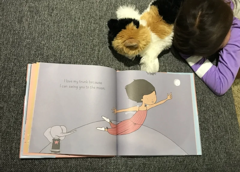 I love all of the animal's unpredictable answers in What Do You Love About You? by Karen Lechelt. Little Lion is falling asleep here as it was past her bedtime when we read this one last time. Below is a book teaser clip from Karen Lechelt's site.