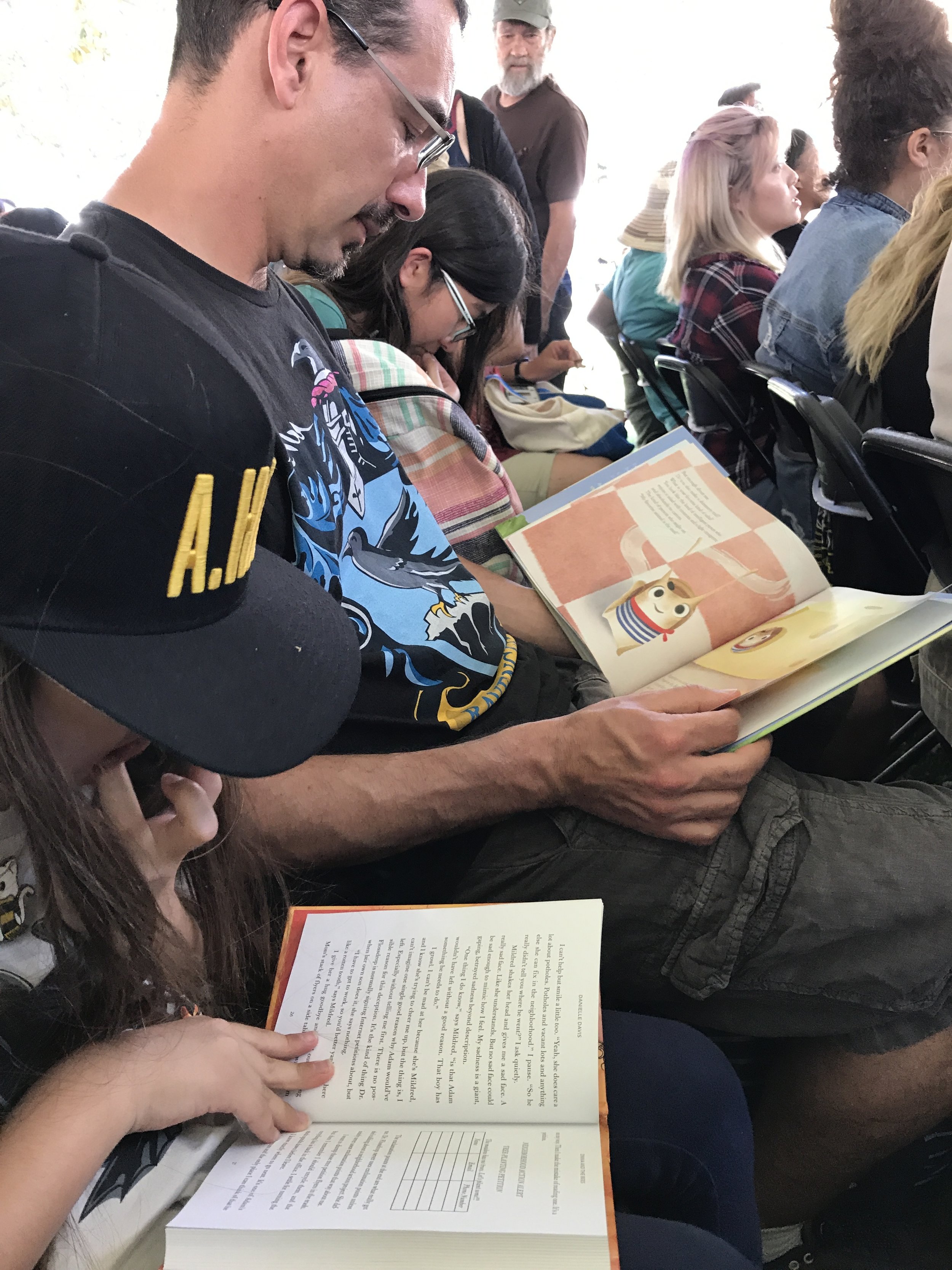 Bookworm Family reading at Book Festival.JPG