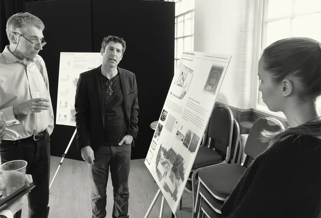 Akay presenting EAA's Royal Heights project to Cllr Tony Page and at a consultation event in Reading
