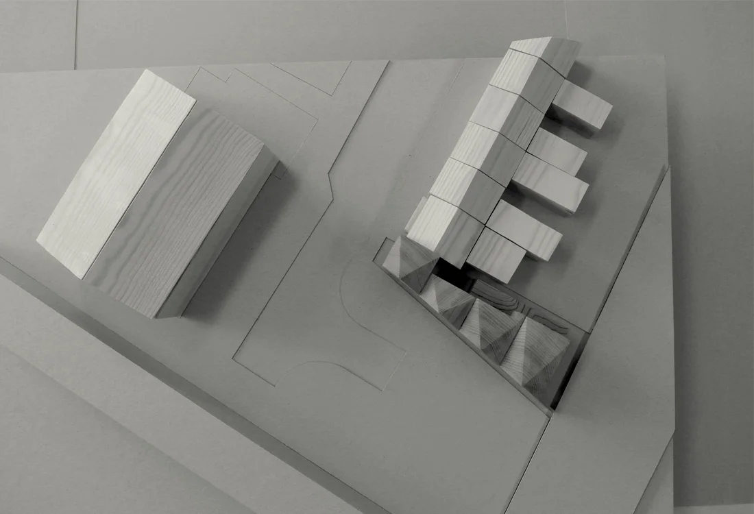 Norman Road is a disused end of terrace site in east London. The proposals aim to complete the terrace with a building that creates a sense of place, character and activity.