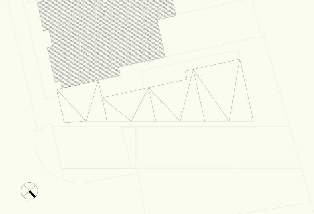 Roof Plan. The long thin volume is broken into four articulated pitched roofs giving the building a unique expression and character.