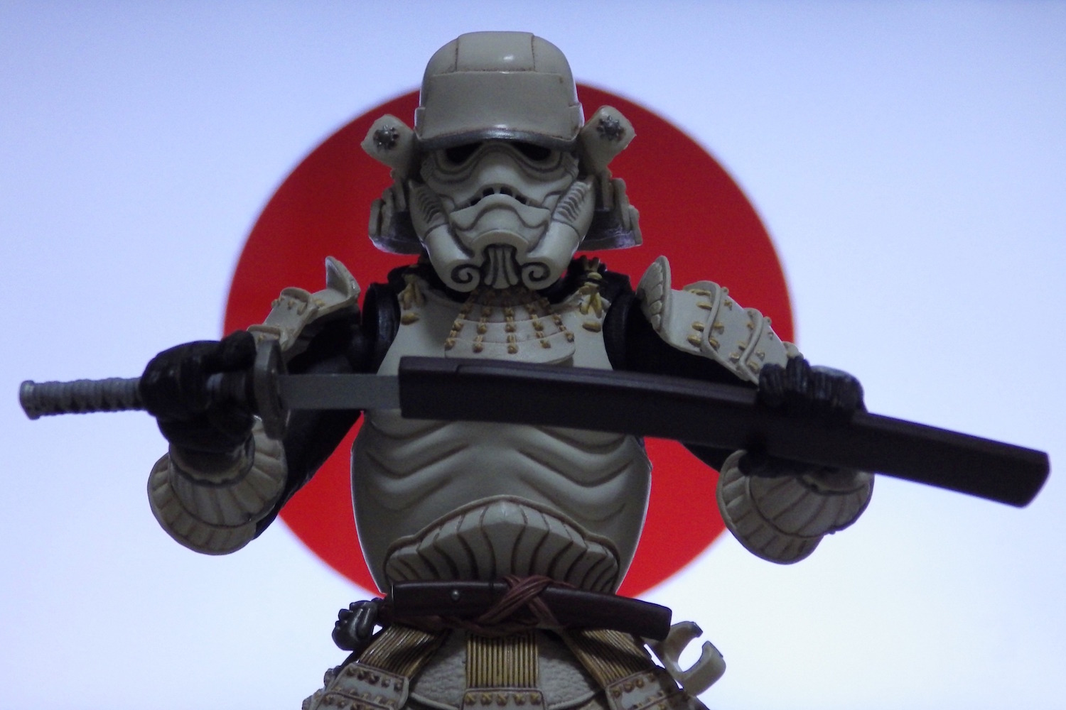 Ashigaru Stormtrooper, posed against the backdrop of the Japanese flag.