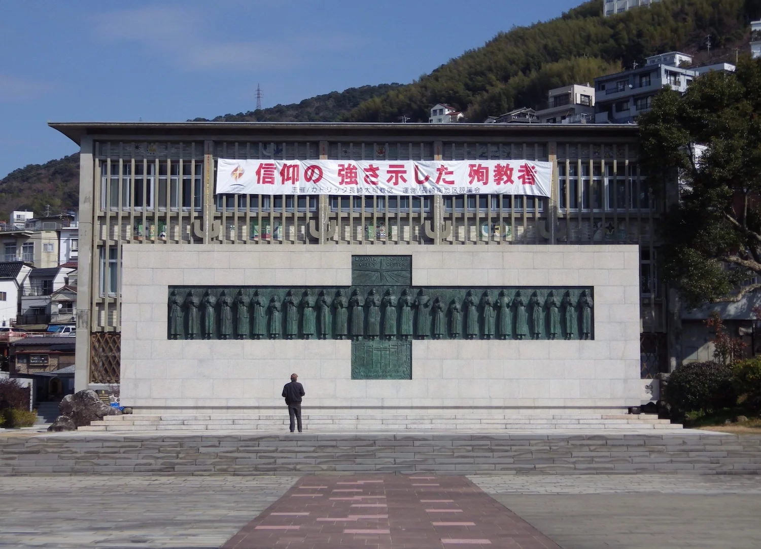 Behind the monument, there is a museum that houses artifacts.
