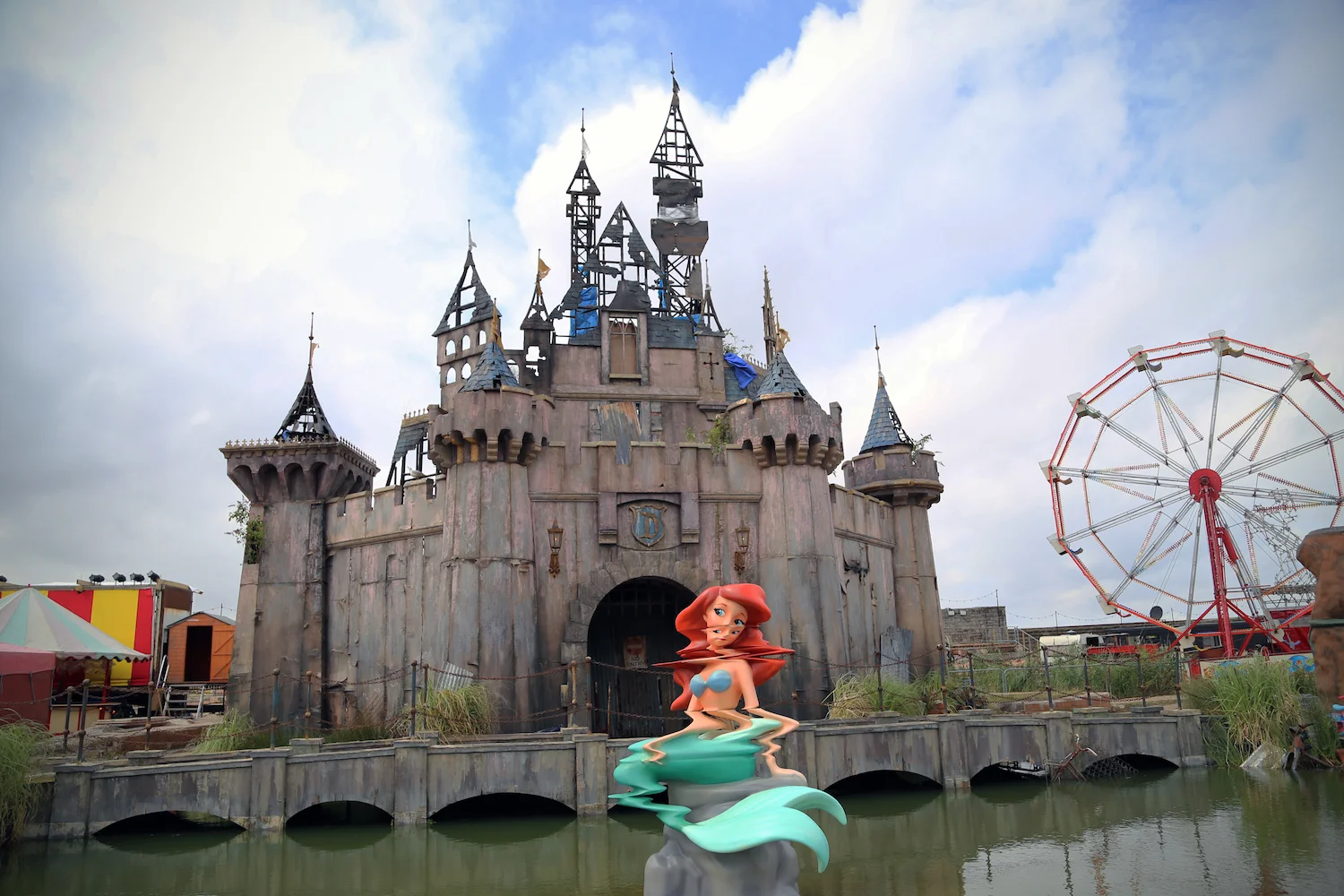 The Dismaland exhibition. Photo by Byrion Smith . Utilized under a CC BY 2.0 license.