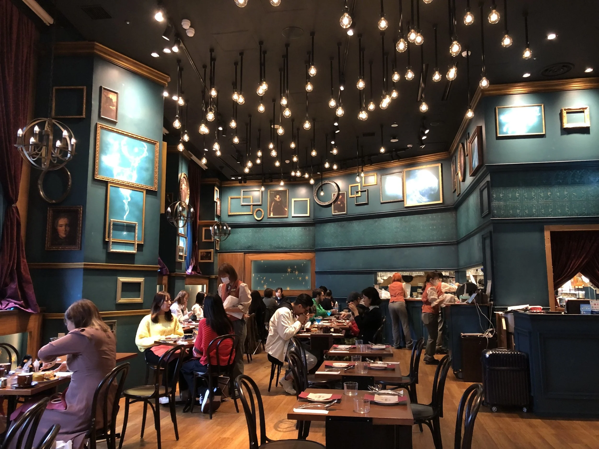 harry potter cafe interior tables lights portraits akasaka tokyo