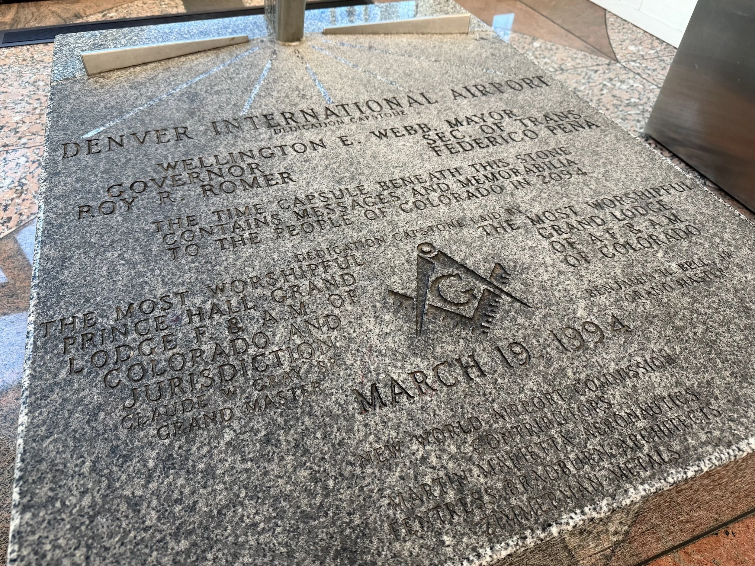dedication capstone denver international airport freemason square compasses symbol