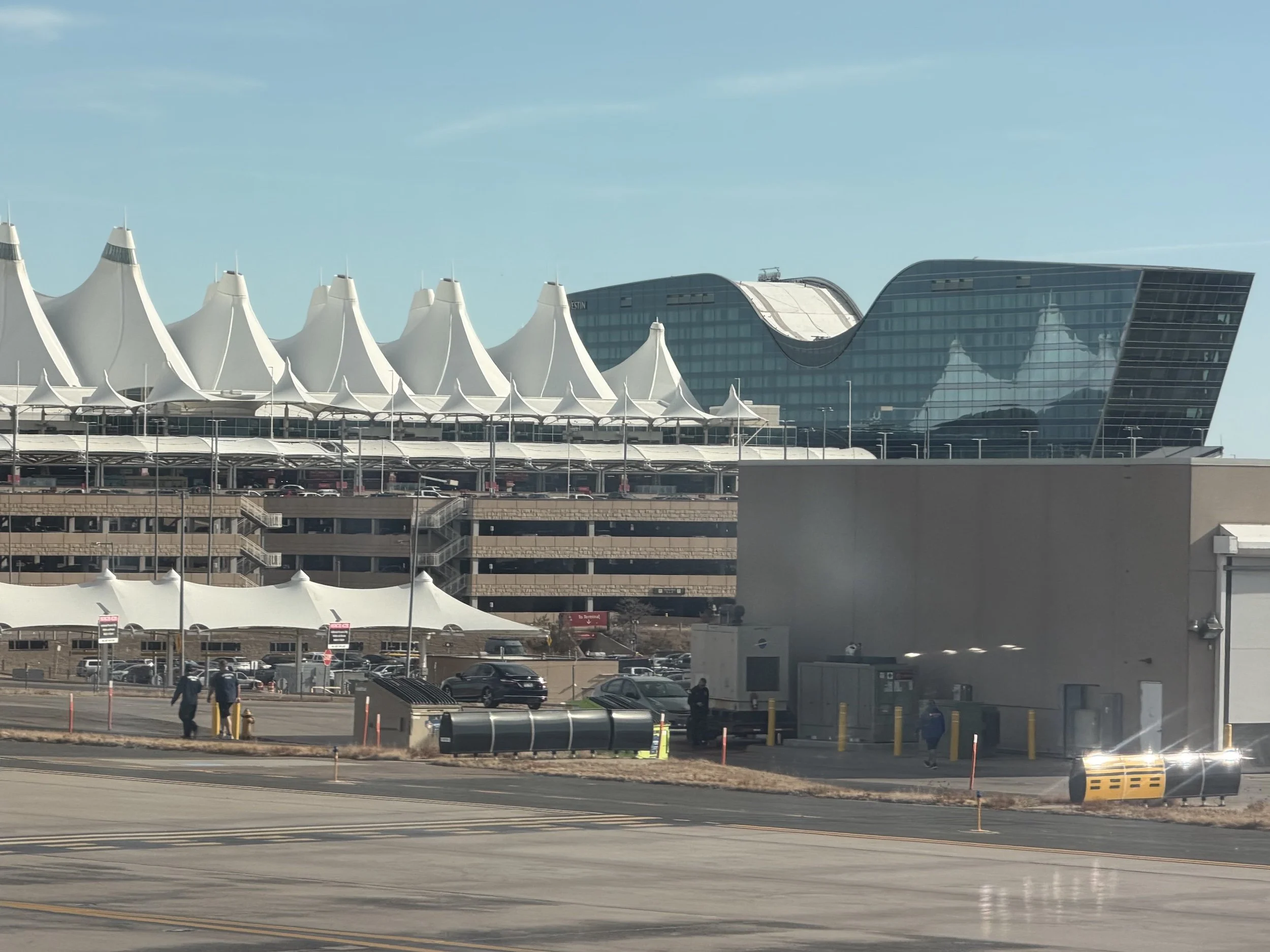 westin hotel wings denver international airport roof white tents runway view