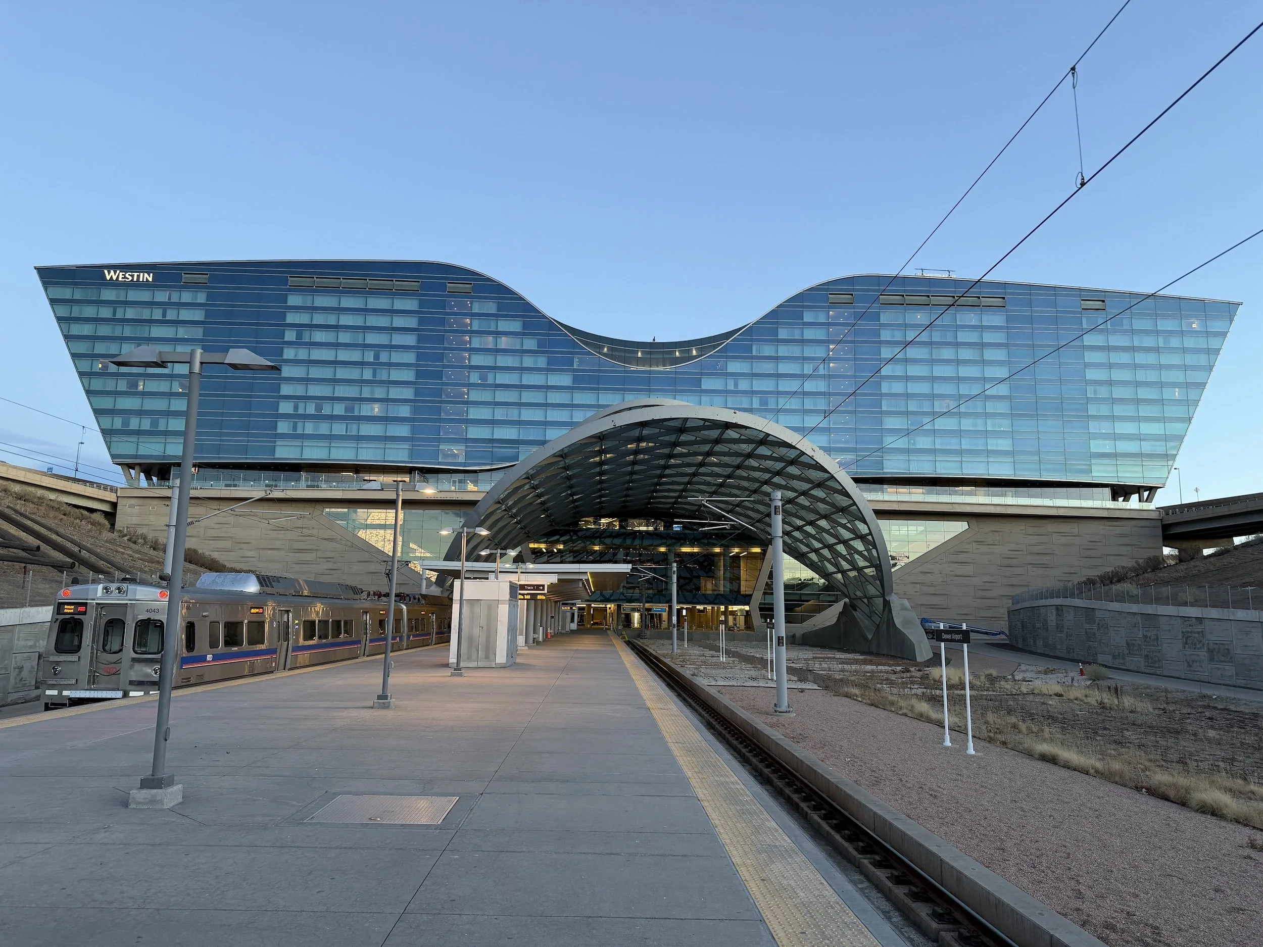westin hotel wings train platform view denver international airport