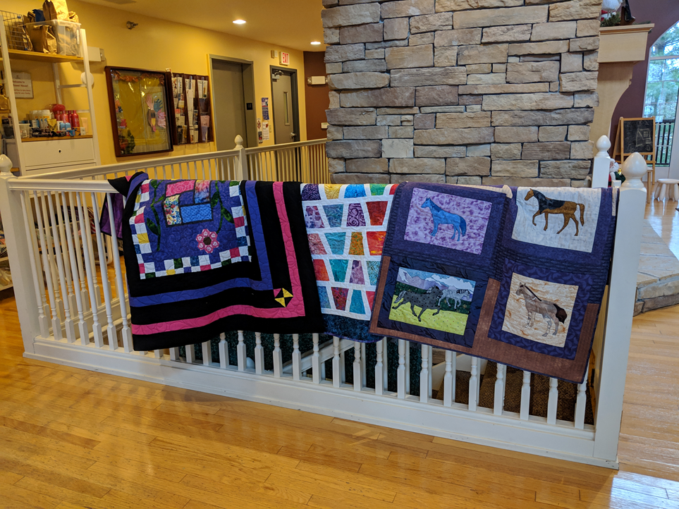 charity quilts delivered to Sunflower house.png