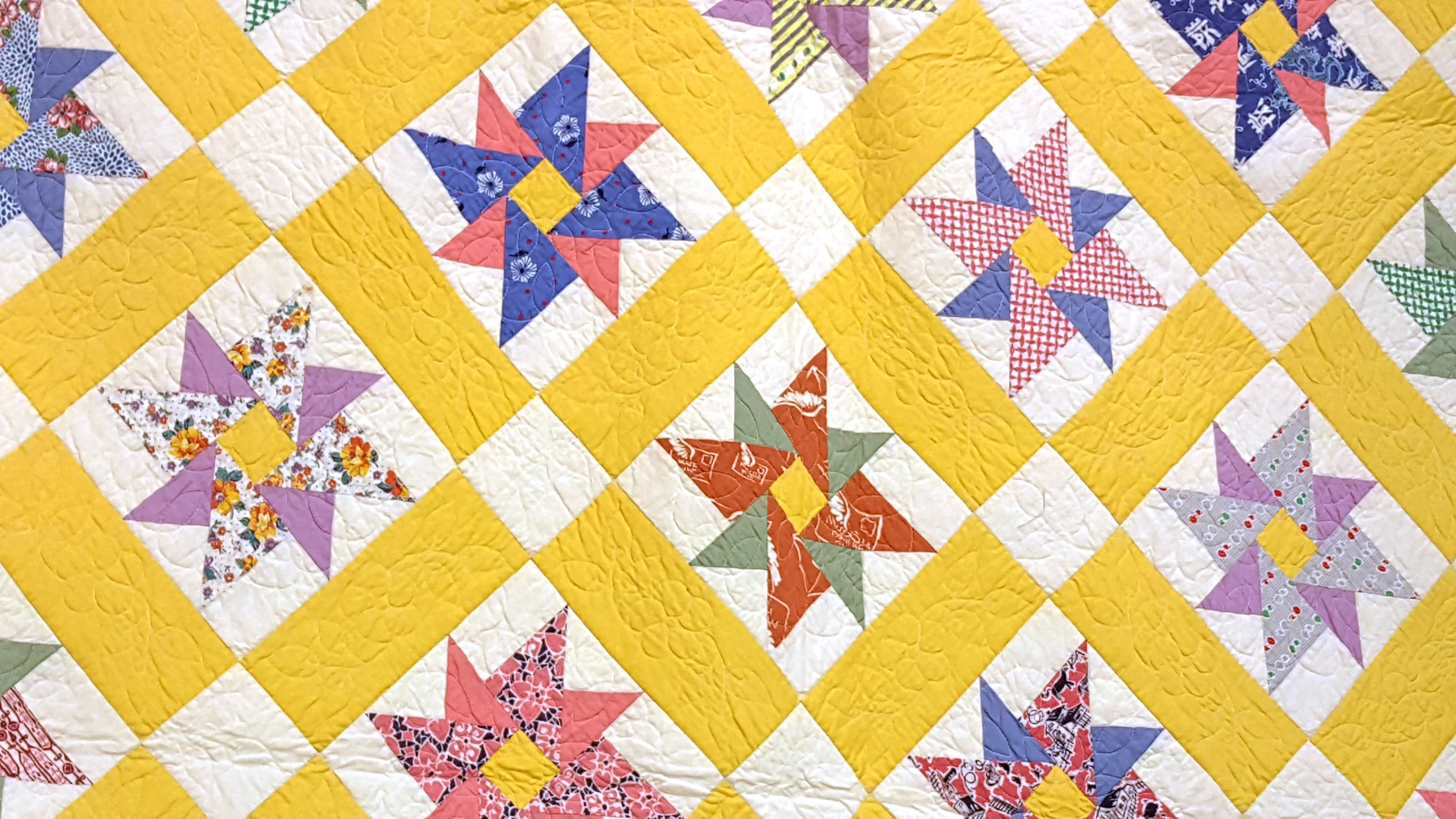 kathy 9 quilt closeup banner.jpg