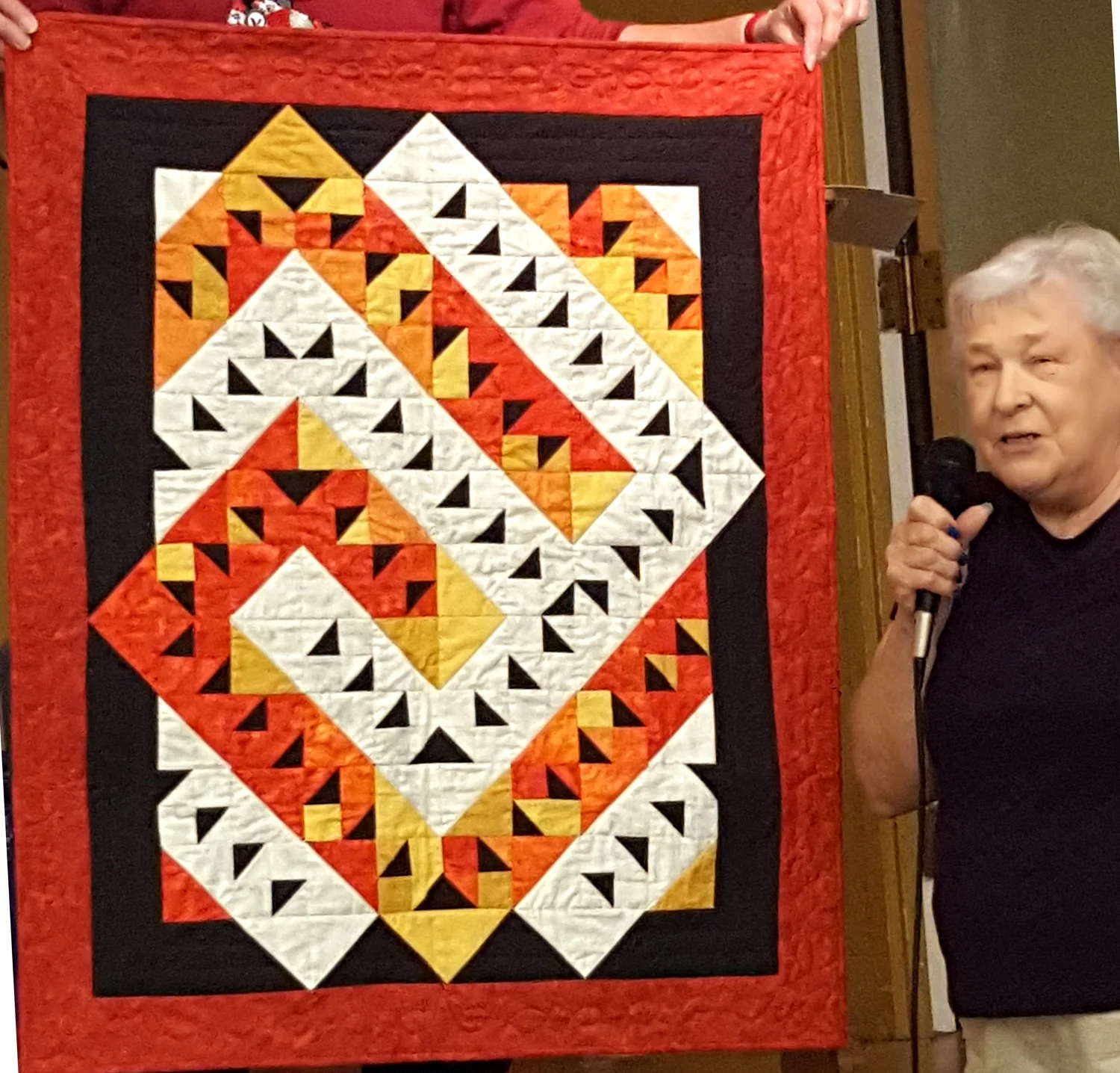 Donna and wall hanging.jpg