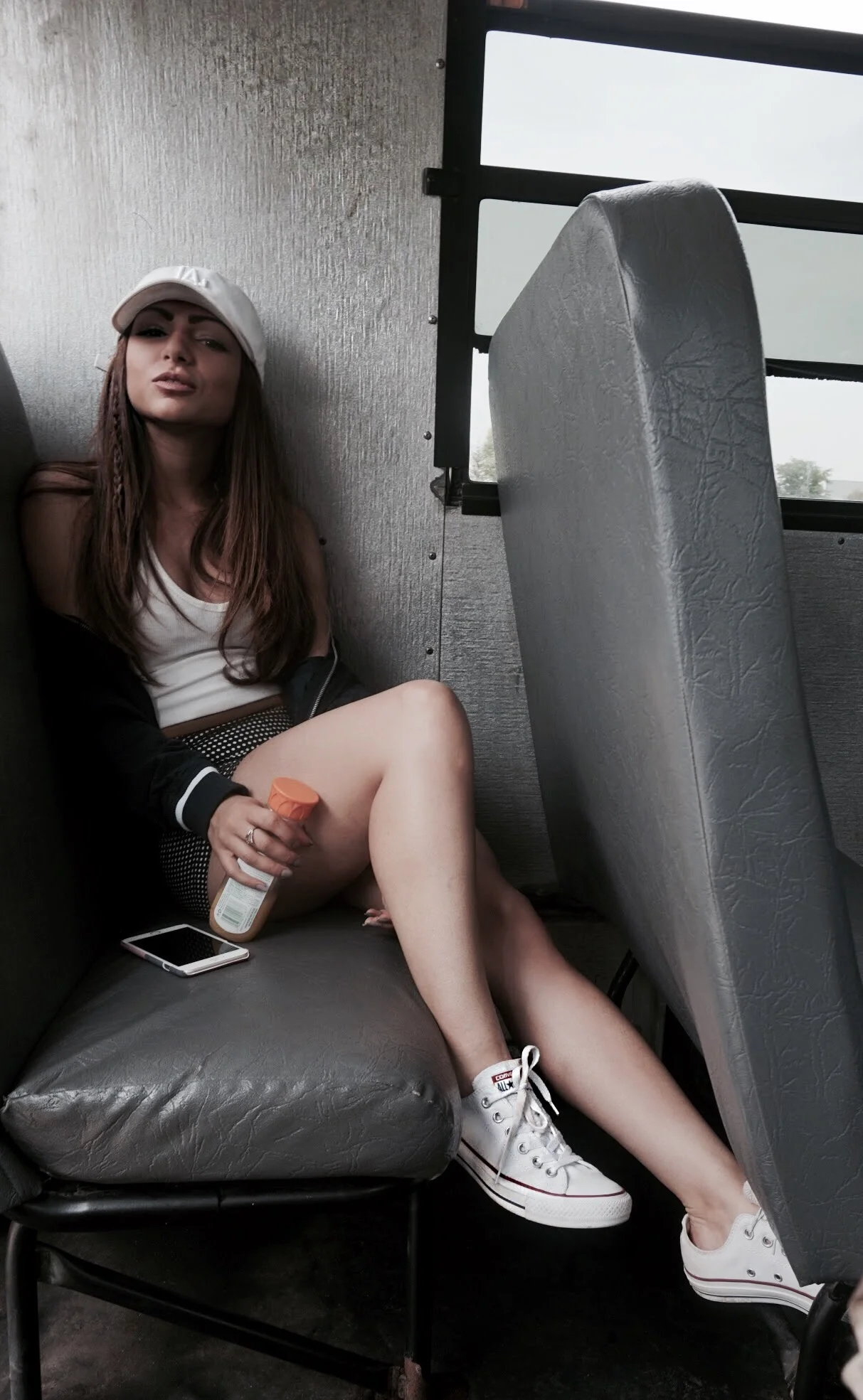 All aboard the school-bus shuttle to the tennis courts with OJ in hand