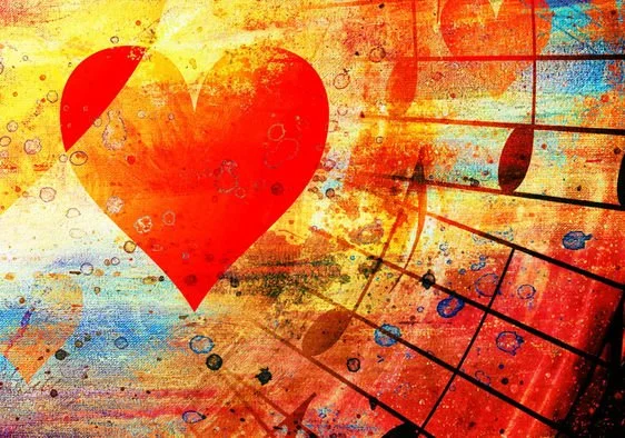 Red heart with musical notes and colorful, abstract background.