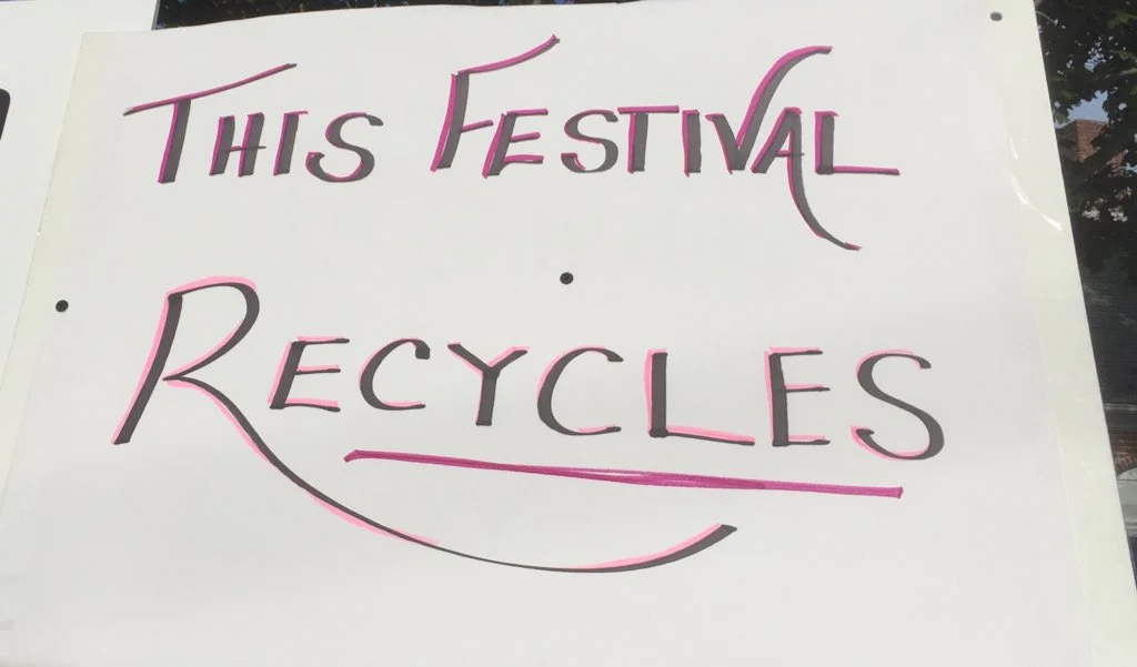 This poster was displayed at the entrance to the festival today in Wellfleet, MA. Great to see the planet coming first for a change.
