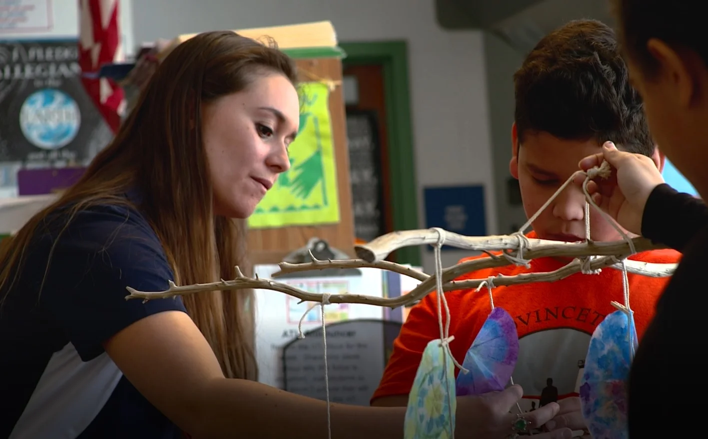 OPAK Co-Founder and President, Melanie Colby, helping a group of students construct their “Sun-catcher Diatoms.”