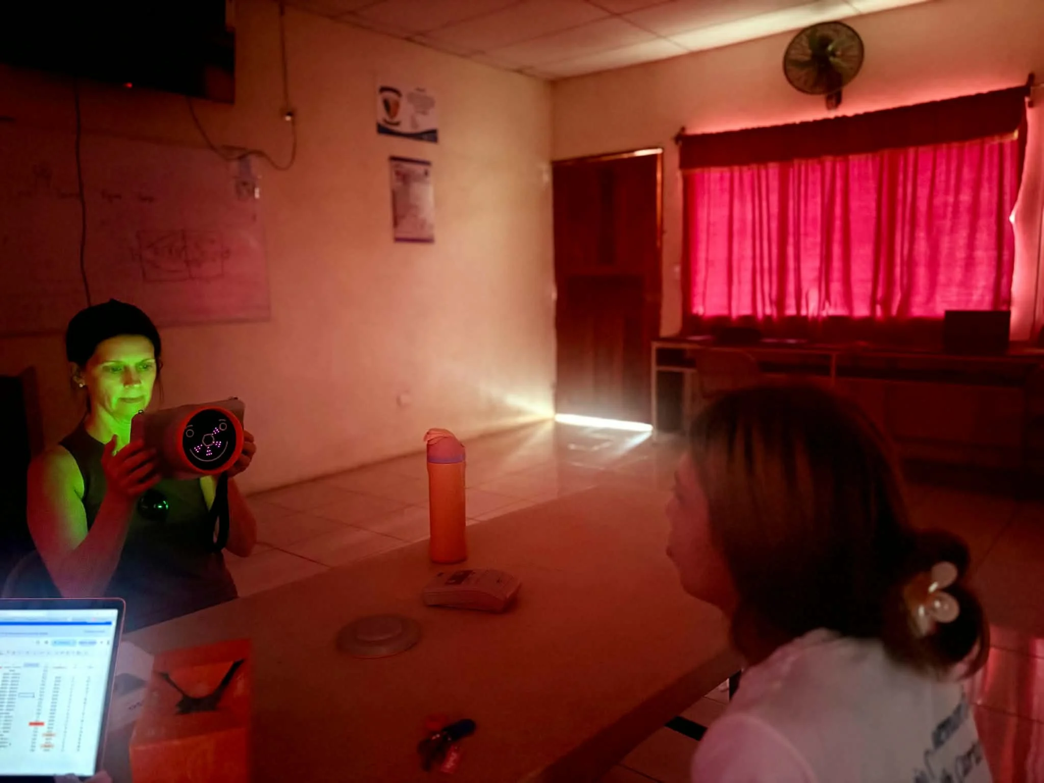 Dr. Jennifer Carter doing eye exam for a student in Nicaragua
