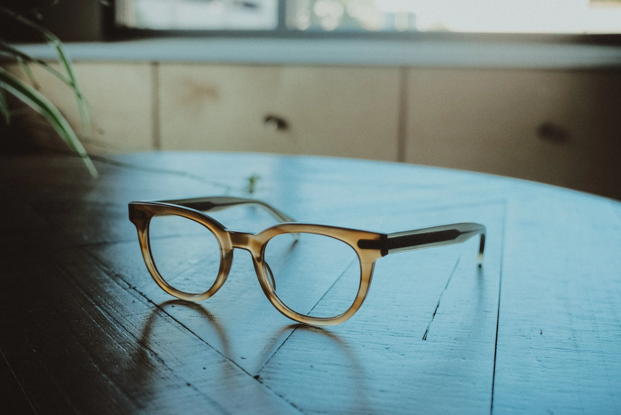 sleek modern glasses sitting on table