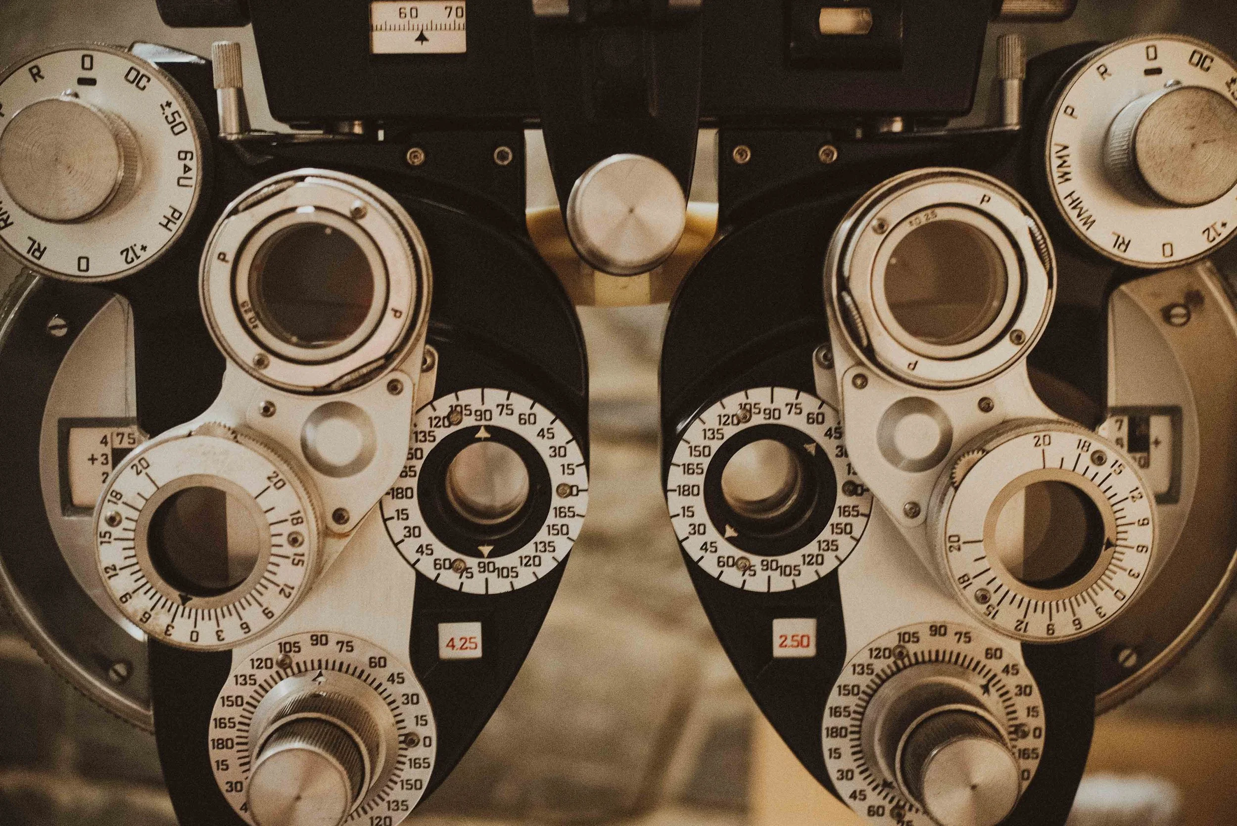 What Is a Phoropter? Why Your Carrollton Eye Doctor Keeps Asking "Which Is Better, 1 or 2?"