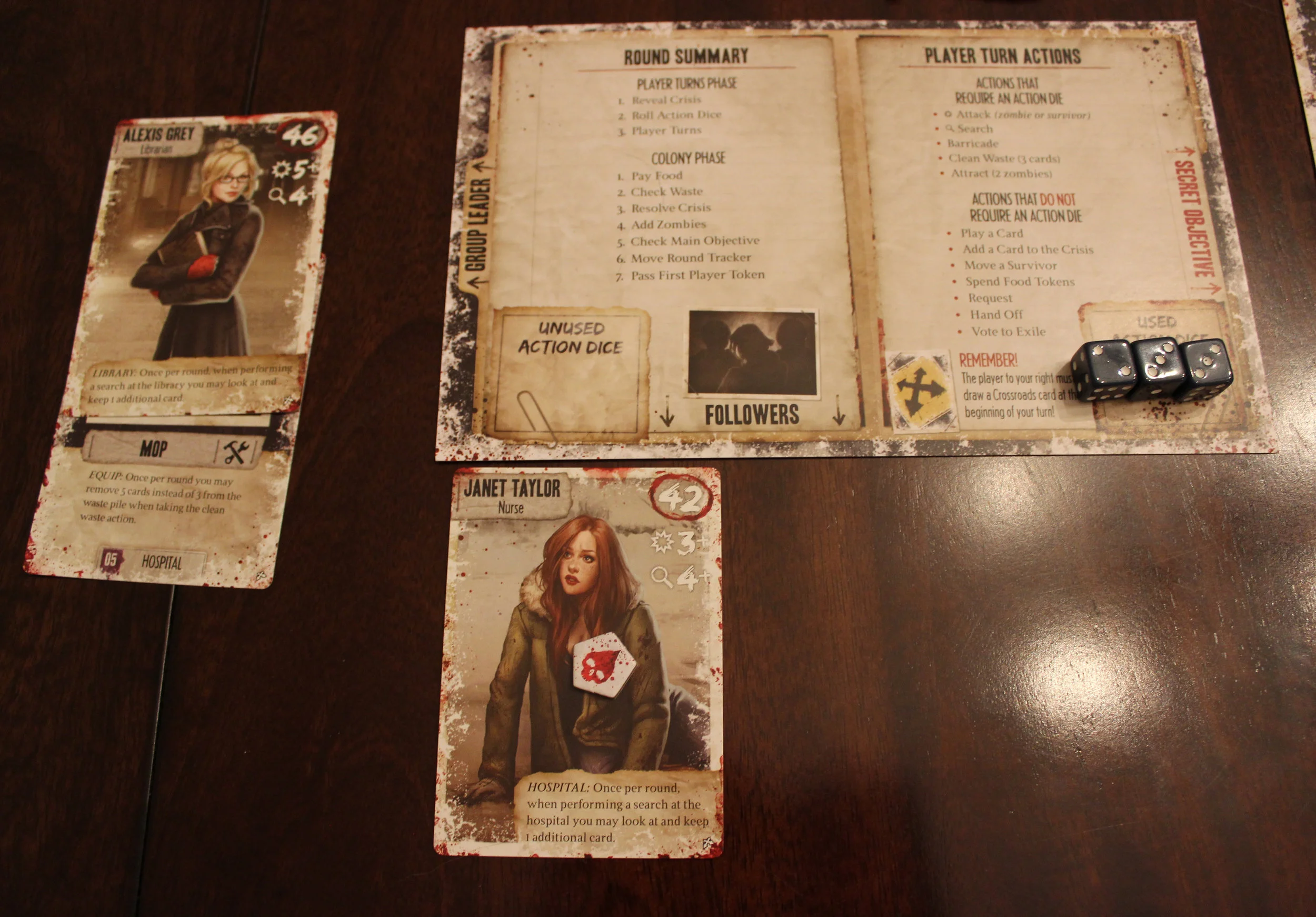 Player two has two characters, one of which has a wound. Three wounds and she's dead.