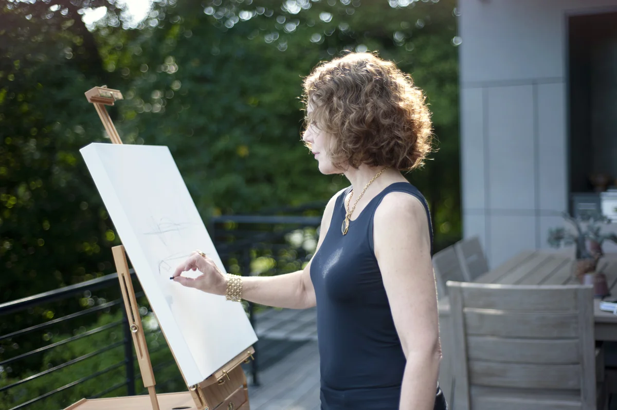 Susan Fine Studio Art Portrait on the deck.jpg