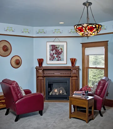 Dakota Suite sitting area with fireplace.