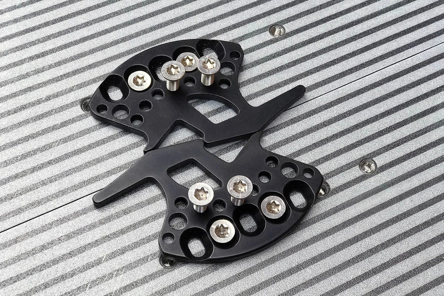 FIGURE 12. Use these threaded holes for angles between +10 and +20 degrees. For -10 to -20, use these same holes to the left of the center position.