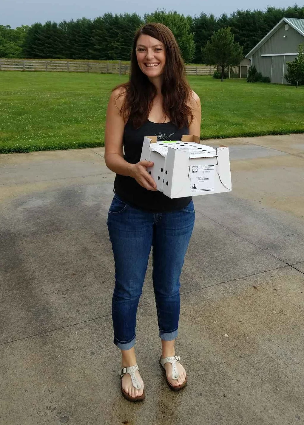 I'm Bev, and this is me holding our day old chicks right after picking them up from the Post Office (8 days after we arrived in OH)