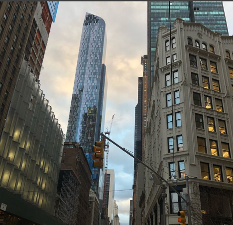 One57, a luxury condominium tower, looms above New York’s popular Central Park neighborhood.