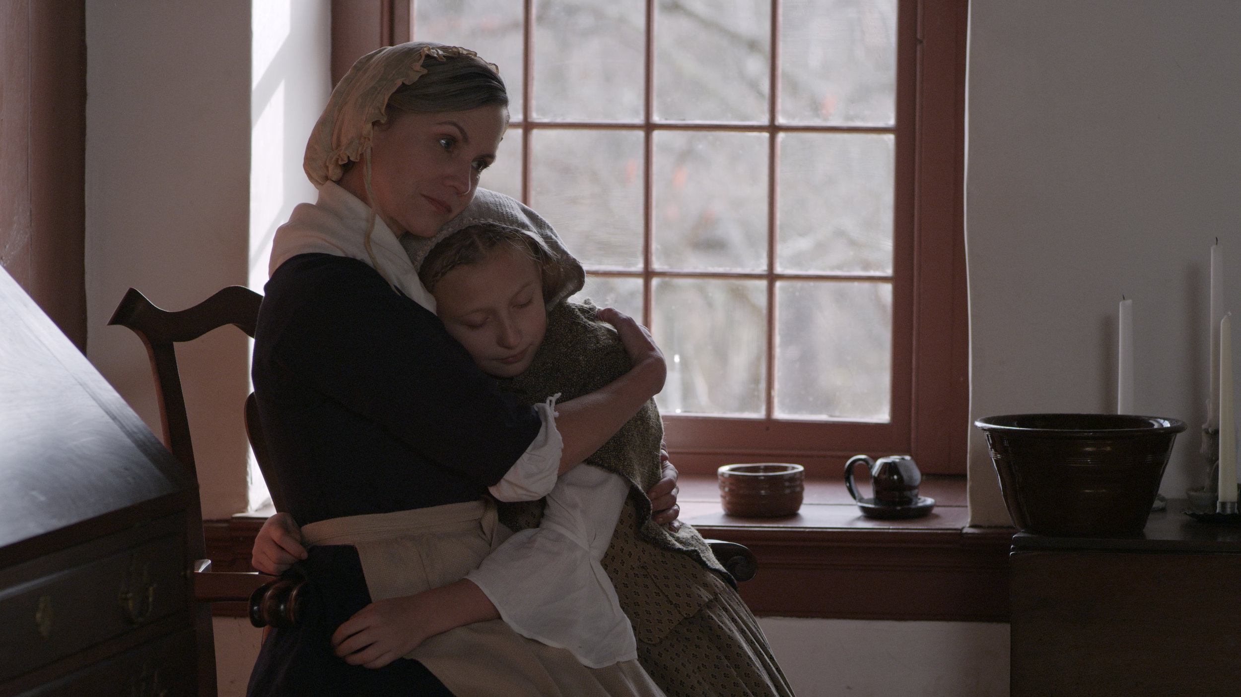 "Emily," Amy Tiehel and "Hannah", Katie Morris share a quiet moment. 