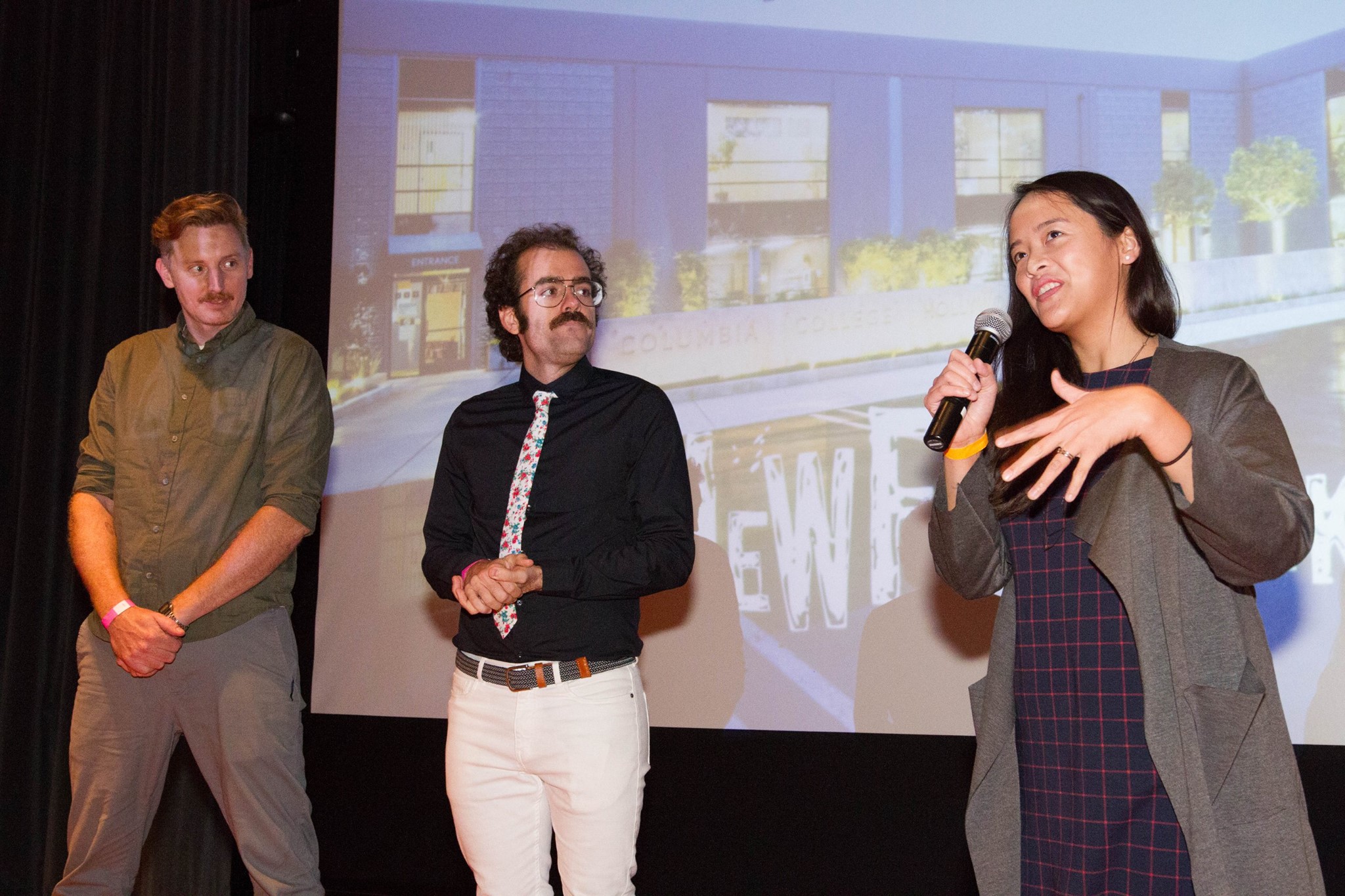 Director Ellie Wen relates the creative challenges of Single Mother Only Daughter to the NewFilmmakers LA DocuSlate audience on December 2nd, 2017 at the South Park Center. From the left, cinematographer of The Duel , Aaron Gambel & I look on.