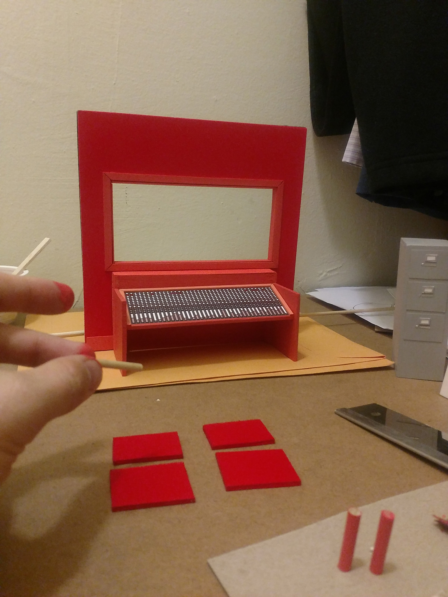Laying out the front & backs of the two chairs. Fingertips starting to accumulate flecks of red paint as its second skin.