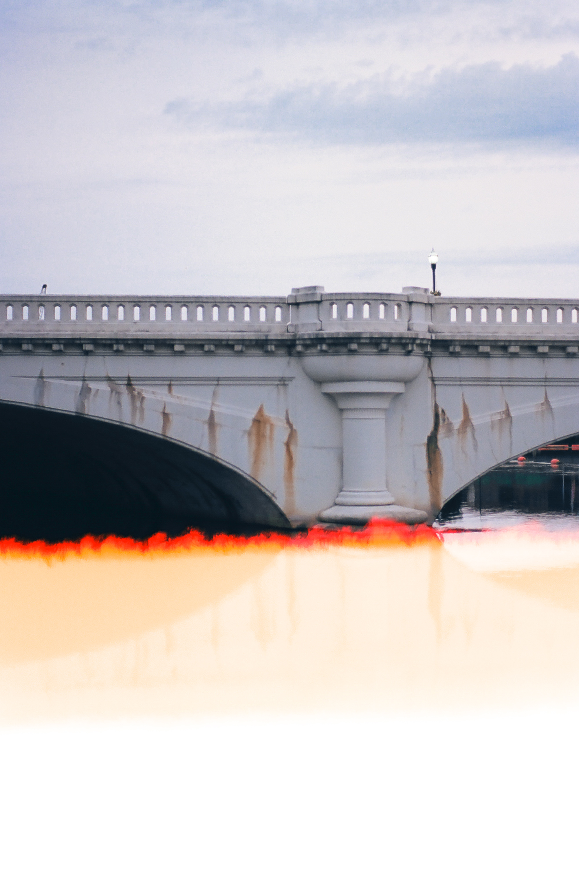 Jefferson Street No. 1 The Jefferson Street bridge captured from the South on film with a light leak in the camera creating a natural burn effect.