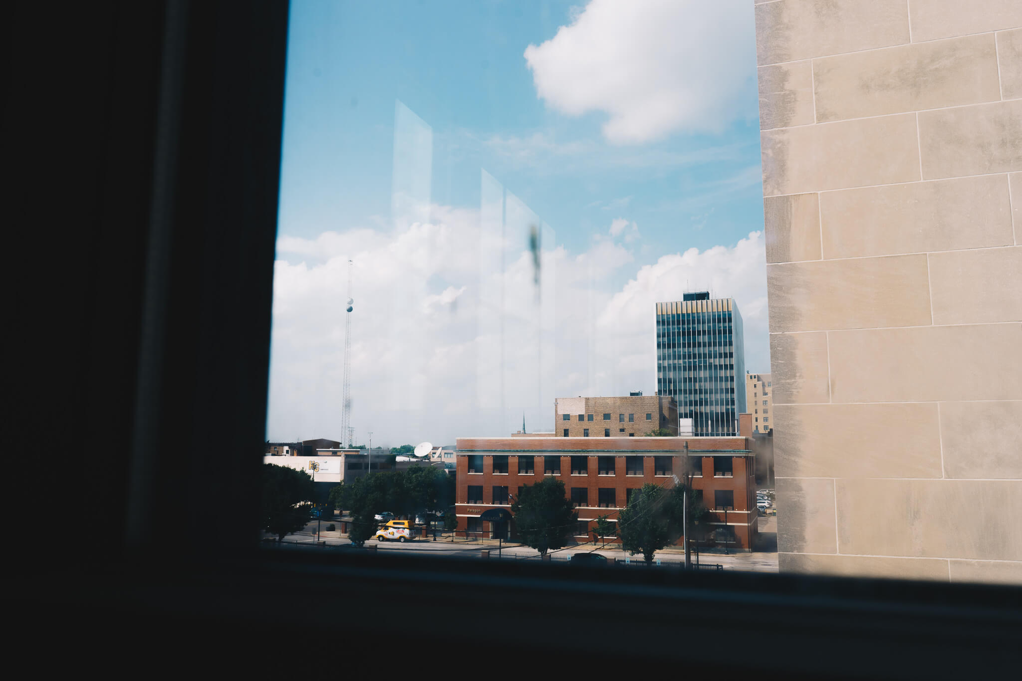 The Hibberd No. 1 A view of downtown South Bend’s County-Building seen out of a window inside the newly-renovated Hibberd Building, with a corner of the AT&T building visible along the right edge. This photograph was featured in our November 2018 story Restoration at The Hibberd .