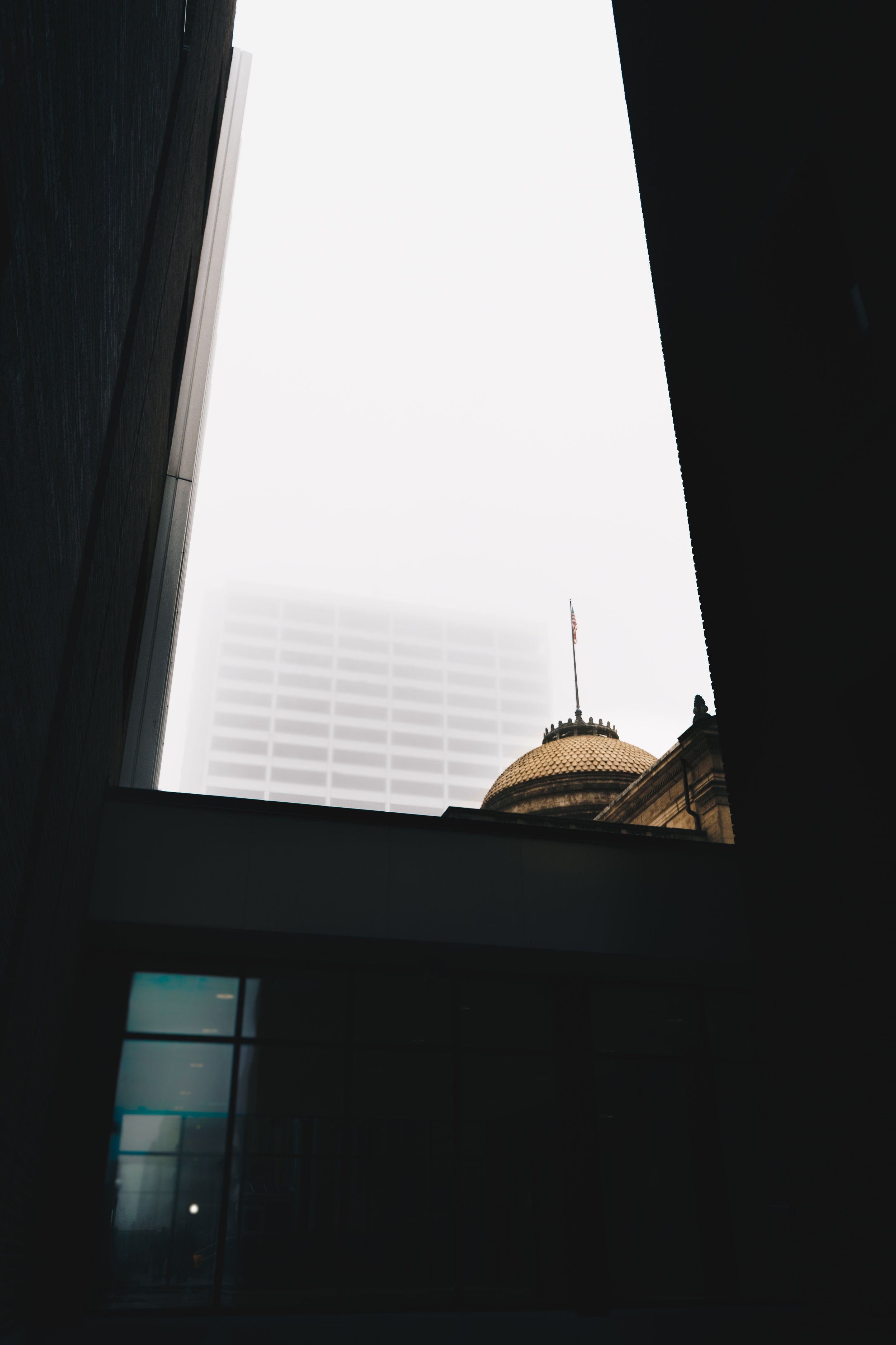 Liberty Tower No. 2 A winter 2017 photograph of downtown South Bend’s Liberty Tower seen through a gap between the County-City Building and First Bank Building.