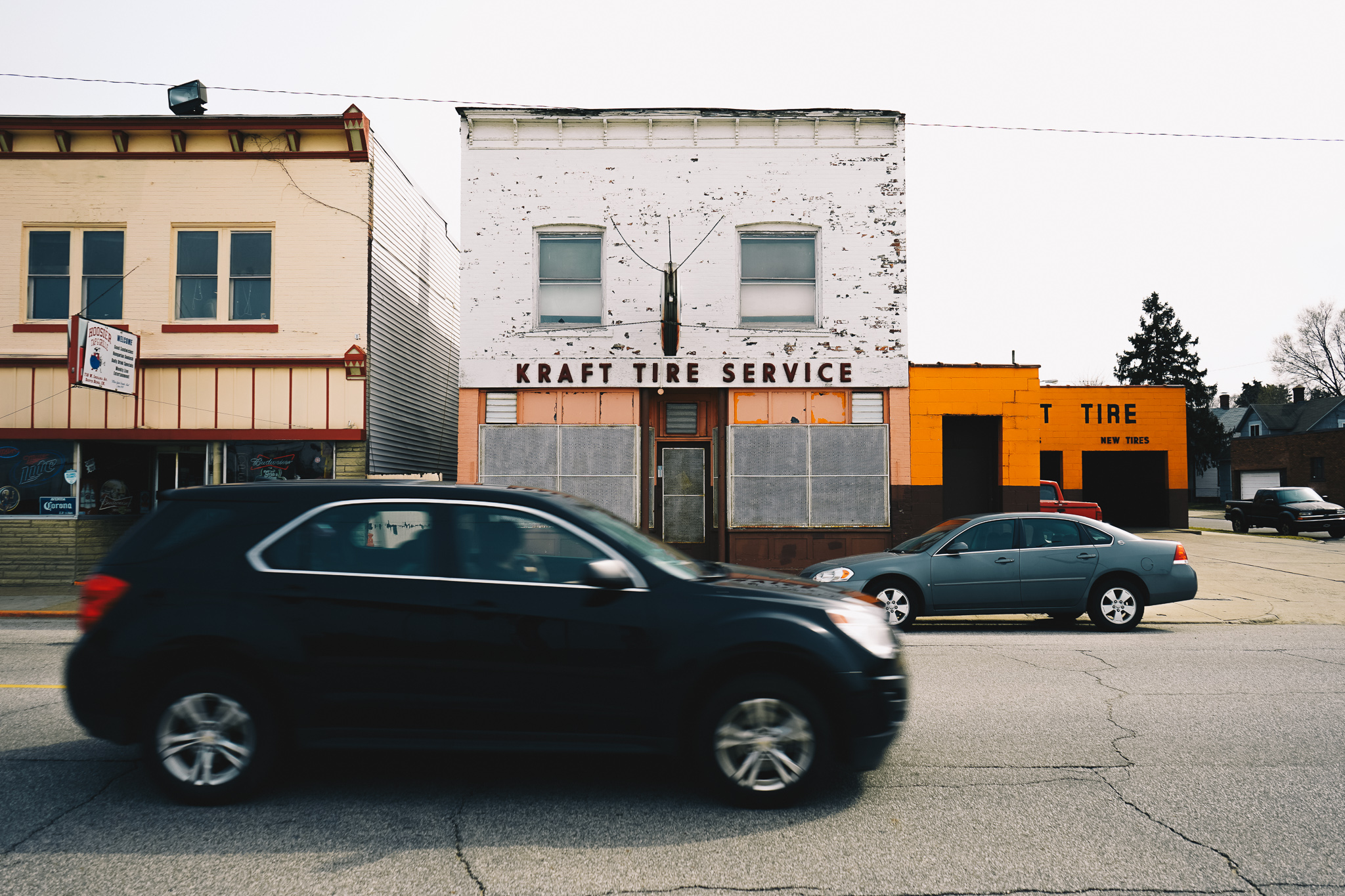 Indiana Avenue No. 1 A view of Kraft Tire Service, one of a string of storefronts along Indiana Avenue between the Rum Village neighborhood and the sprawling land formerly home to Studebaker and Oliver Plow. This photograph was featured in our April 2017 story Afternoon Stroll on Indiana Avenue .
