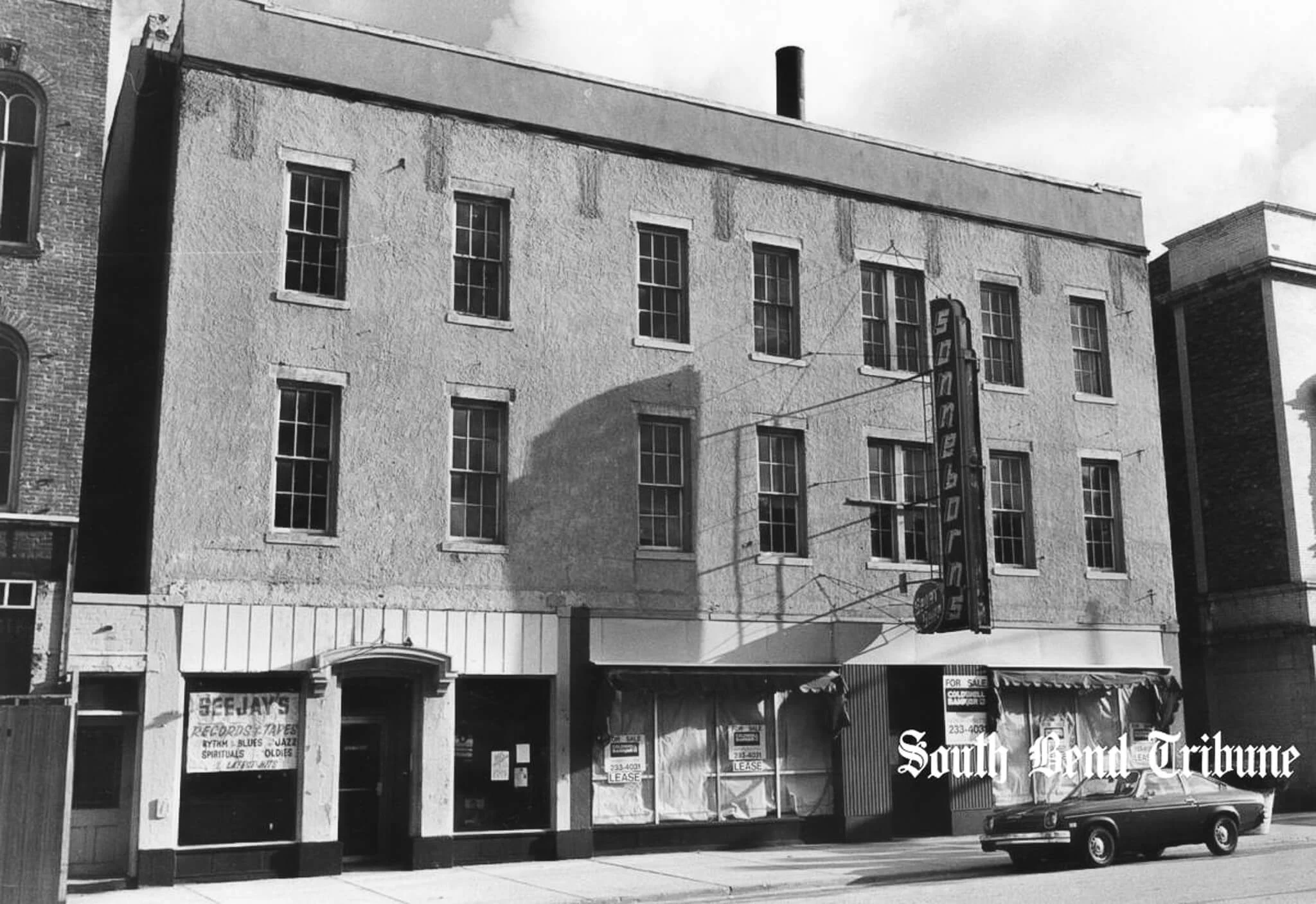 A South Bend Tribune archive photograph showing the building for sale after Sonneborn’s closure.