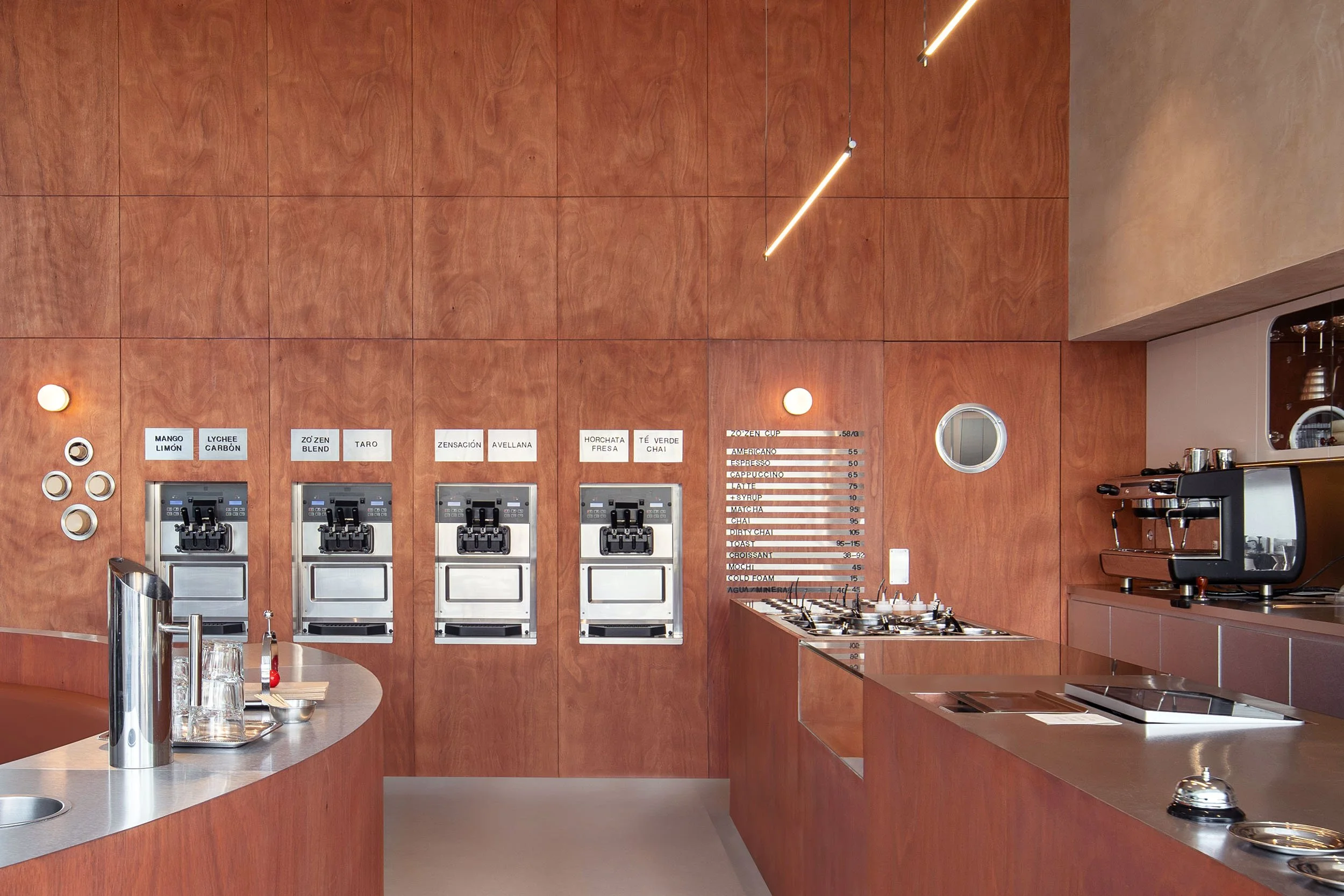 Full interior view of Zo'Zen highlighting the soft balance of wooden paneling and textured limewash walls in San Pedro Garza García, designed by Mariel Lozano Studio, photo by Recording Architecture.