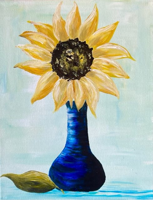 sunflower single in blue vase.jpg