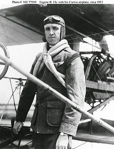 Eugene Ely with his Curtiss biplane.jpg