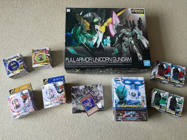 Liam’s loot - Gundam (requires assembly), Kamen Rider (one of which includes a DVD), Yu-Gi-Oh cards