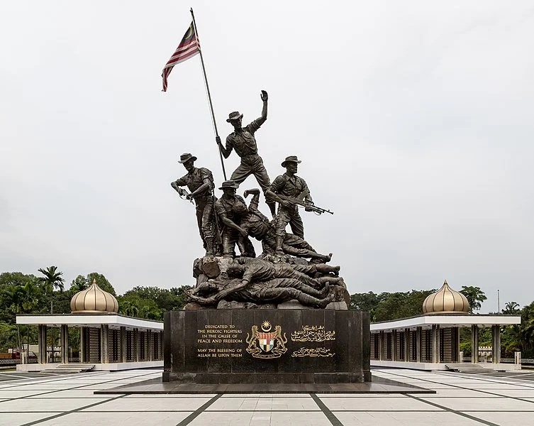 Statues, soldiers, Malaysian flag, monument, domes, At The National Monument of Malaysia, Joy V Spicer