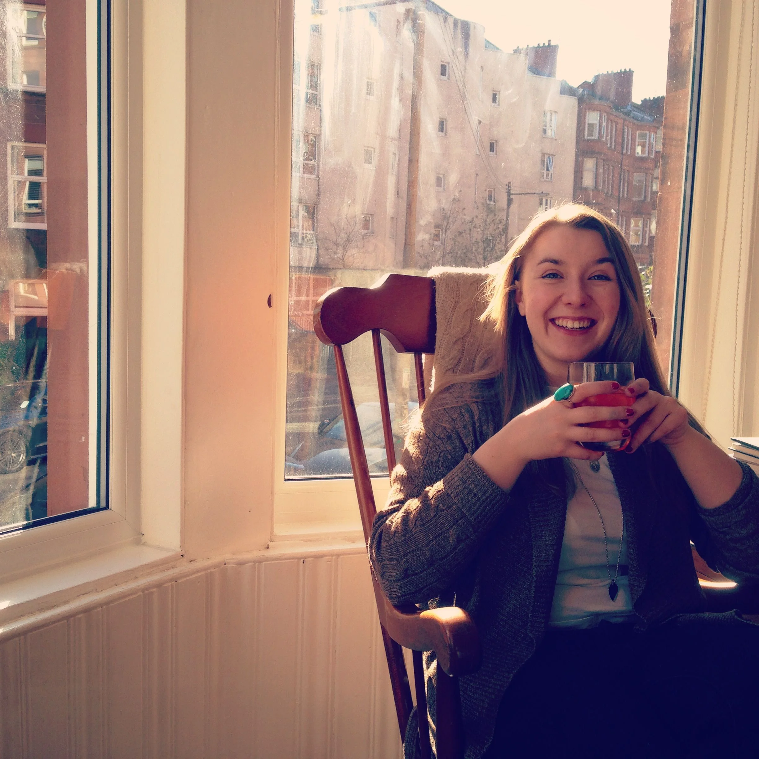 Yoga student drinking coffee