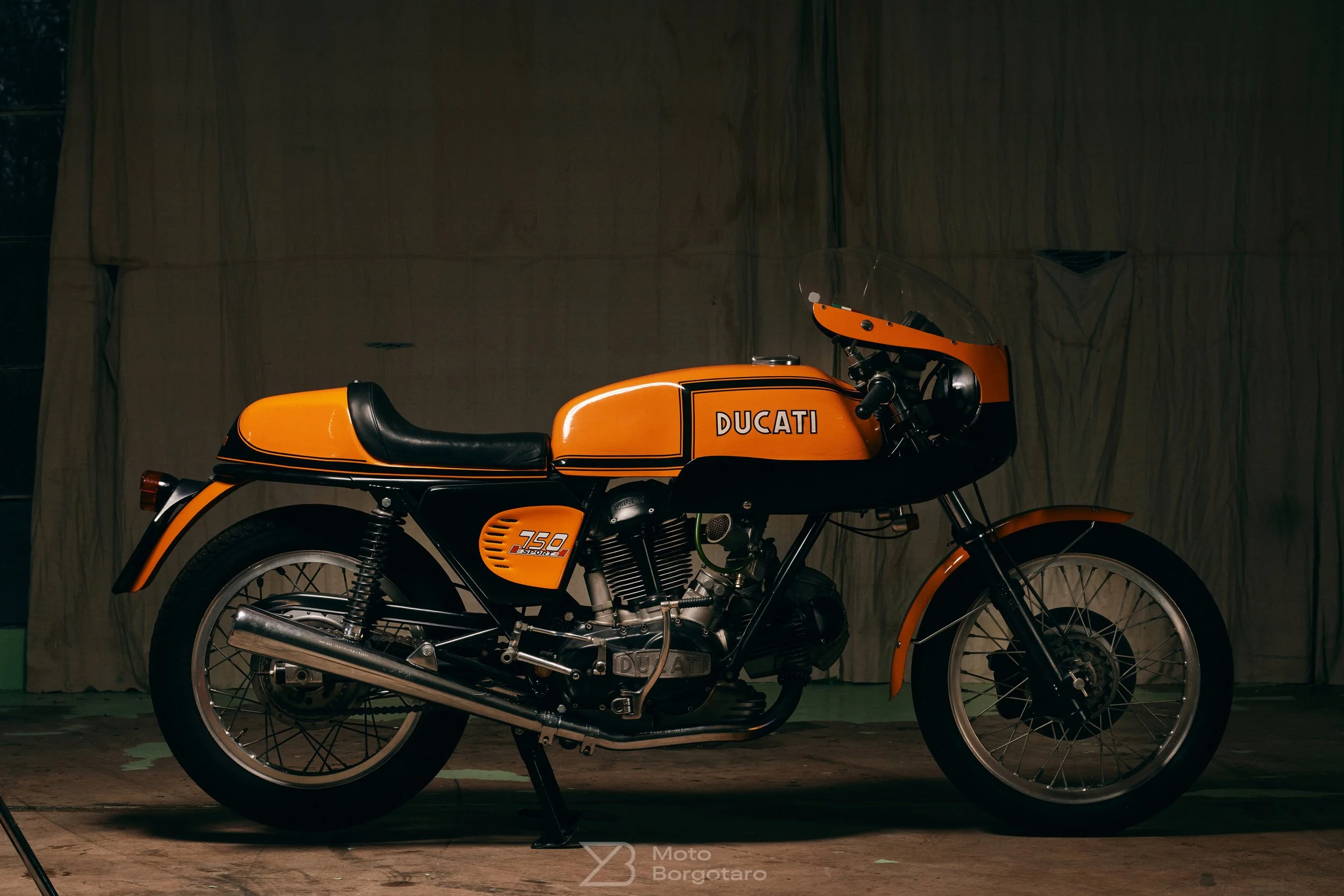           

 
   1972 Ducati 750S    SOLD     Engine number: DM750 751498 Frame number: DM750S 751411   Here we present a true first-year Z stripe Sport, in the past decade we have seen countless fake Z stripe sports presented for sale, some obvious 