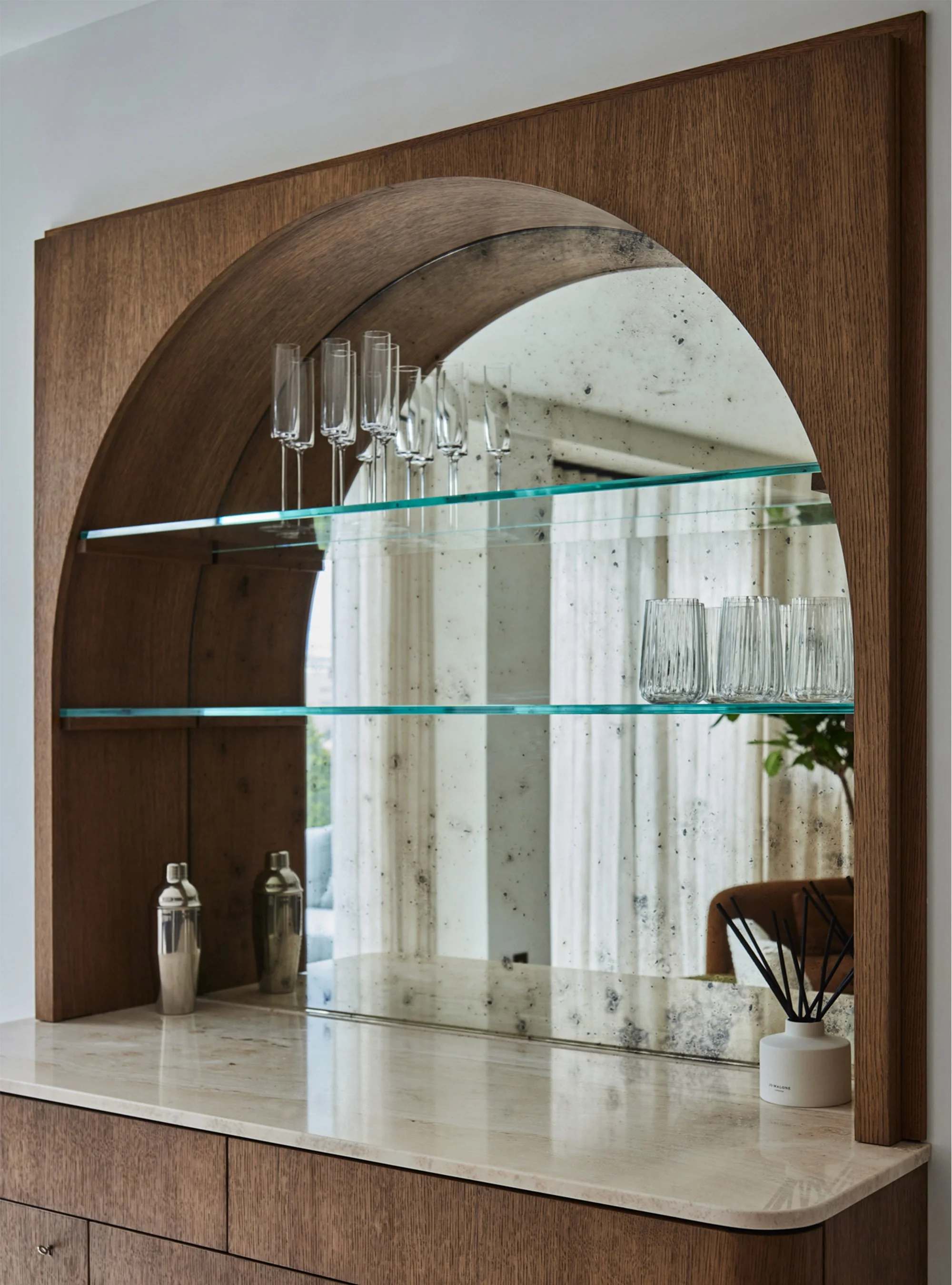 Calm-Mayfair-retreat-_0015_Foxed-glass-drinks-cabinet-close-up.jpg