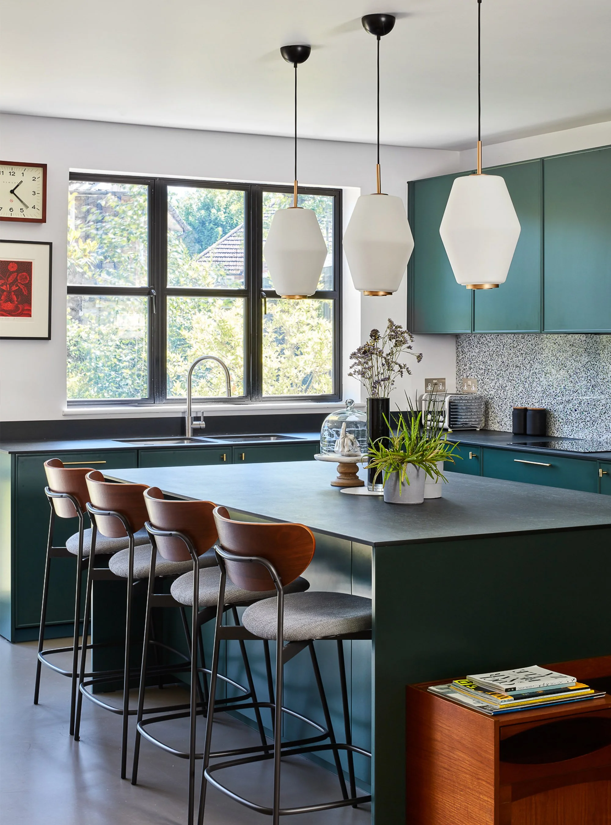Young-professional-home_0008_Modern-teal-kitchen-garden-view-with-kitchen-island.jpg